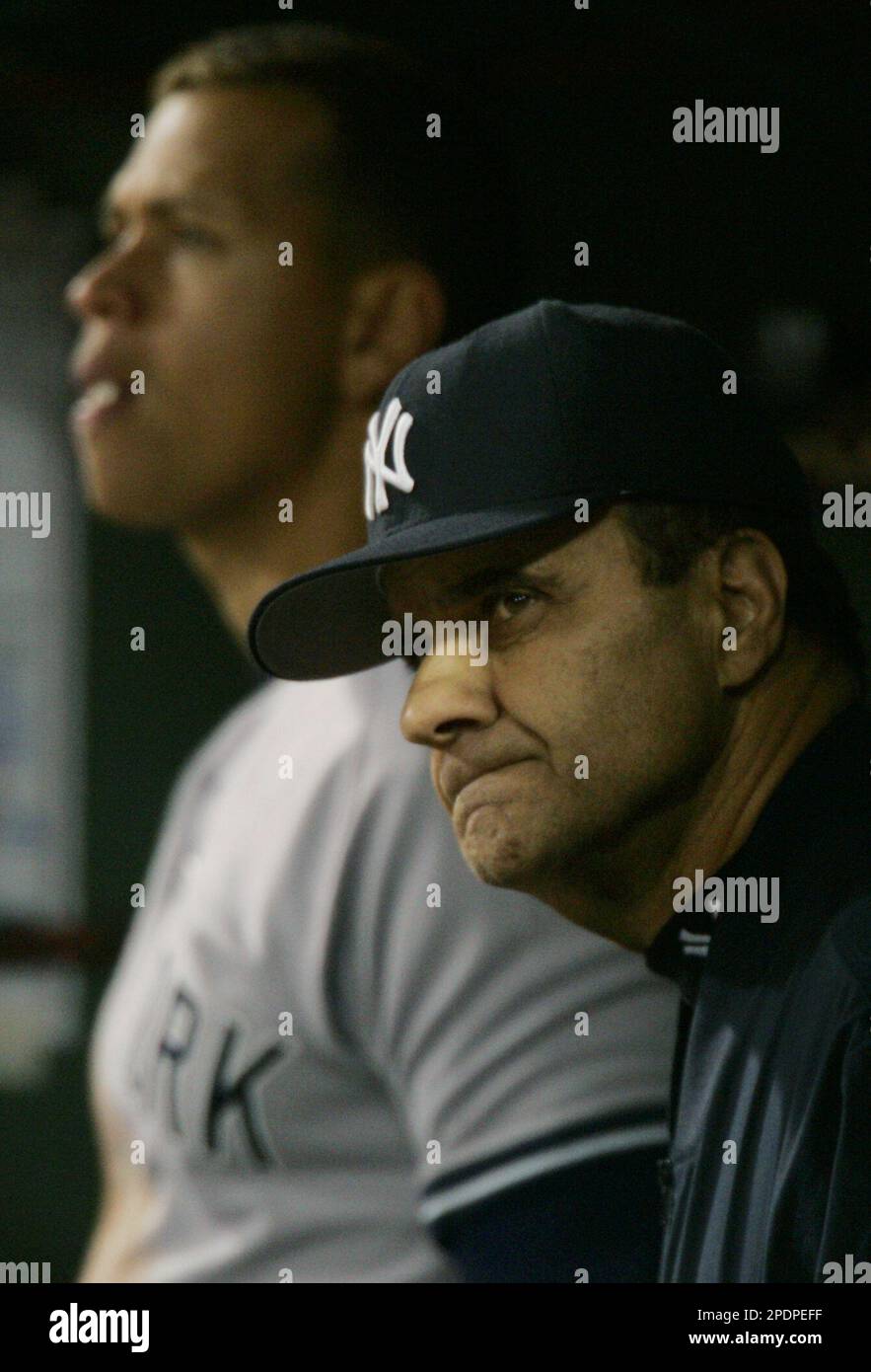 New York Yankees skipper Joe Torre (6) hugs third baseman Alex Rodriguez  after they defeated the Boston Red Sox, 8-4, assuring them of another AL  East Championship at Fenway Park in Boston