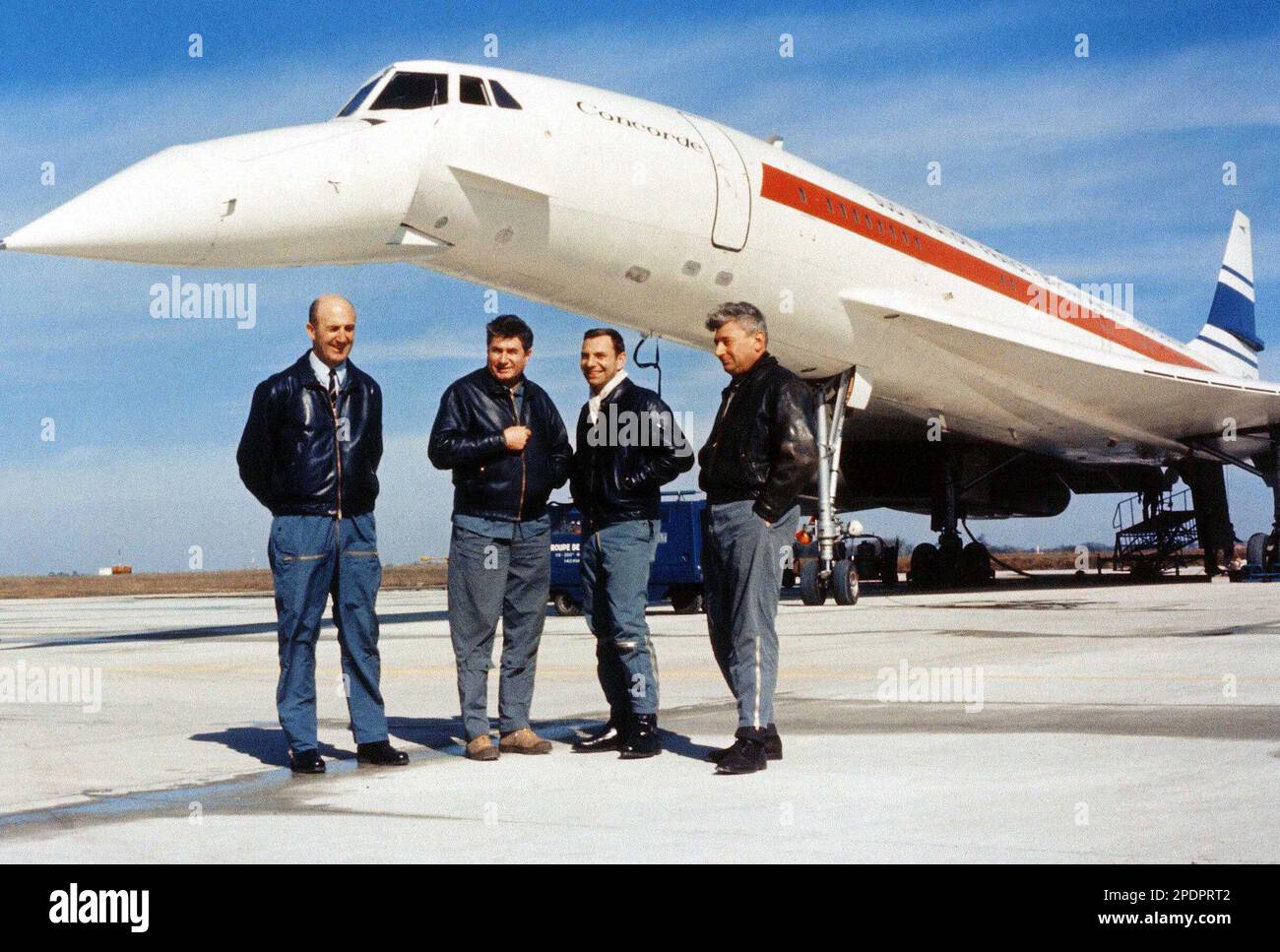 FILE ** Flight engineer Henri Perrier, third left, test pilot Jean Guignard,  second left, chief test pilot Andre Turcat, left, and flight engineer  Michel Retif, right, are seen in Toulouse in