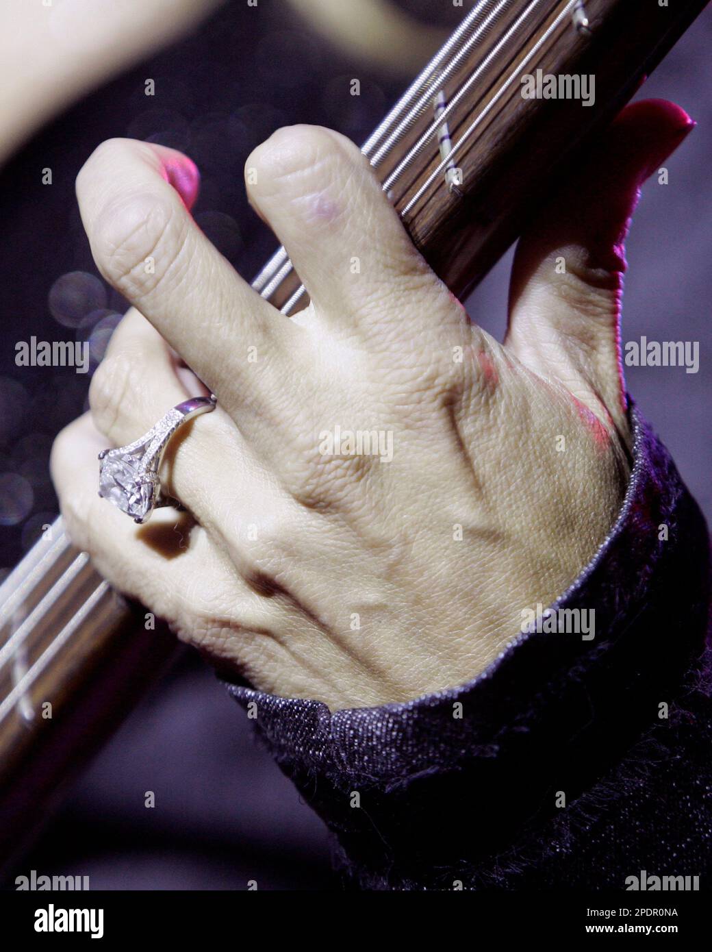 Singer and songwriter Sheryl Crow s engagement ring from cyclist Lance Armstrong is seen during her performance at the Boston Mix 98.5 Fest at the Bank of America Pavilion in Boston Saturday Sept