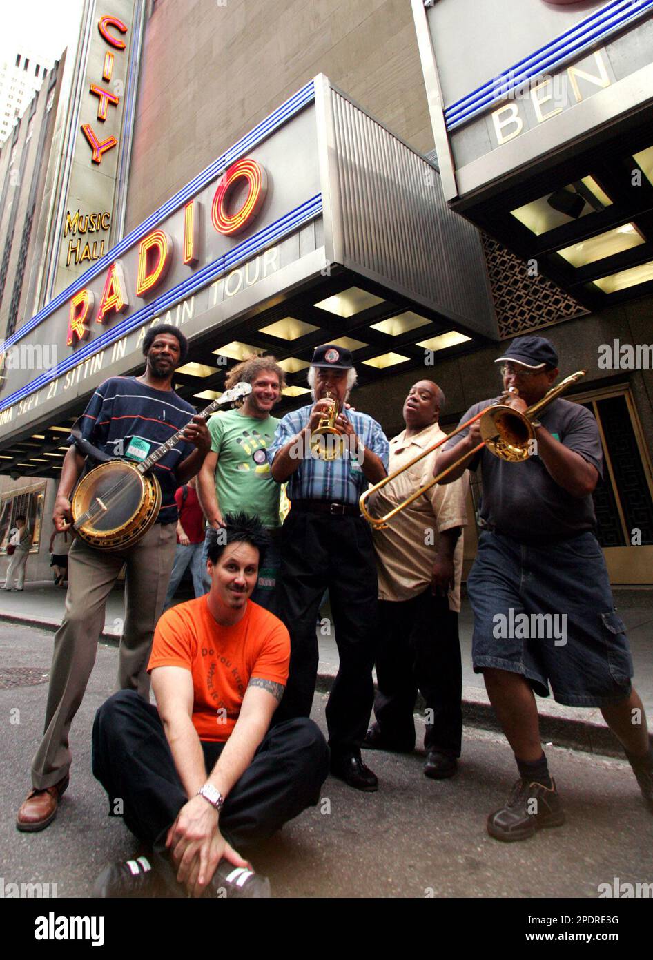 Members of the New Orleans Preservation Hall Jazz Band gather in front ...