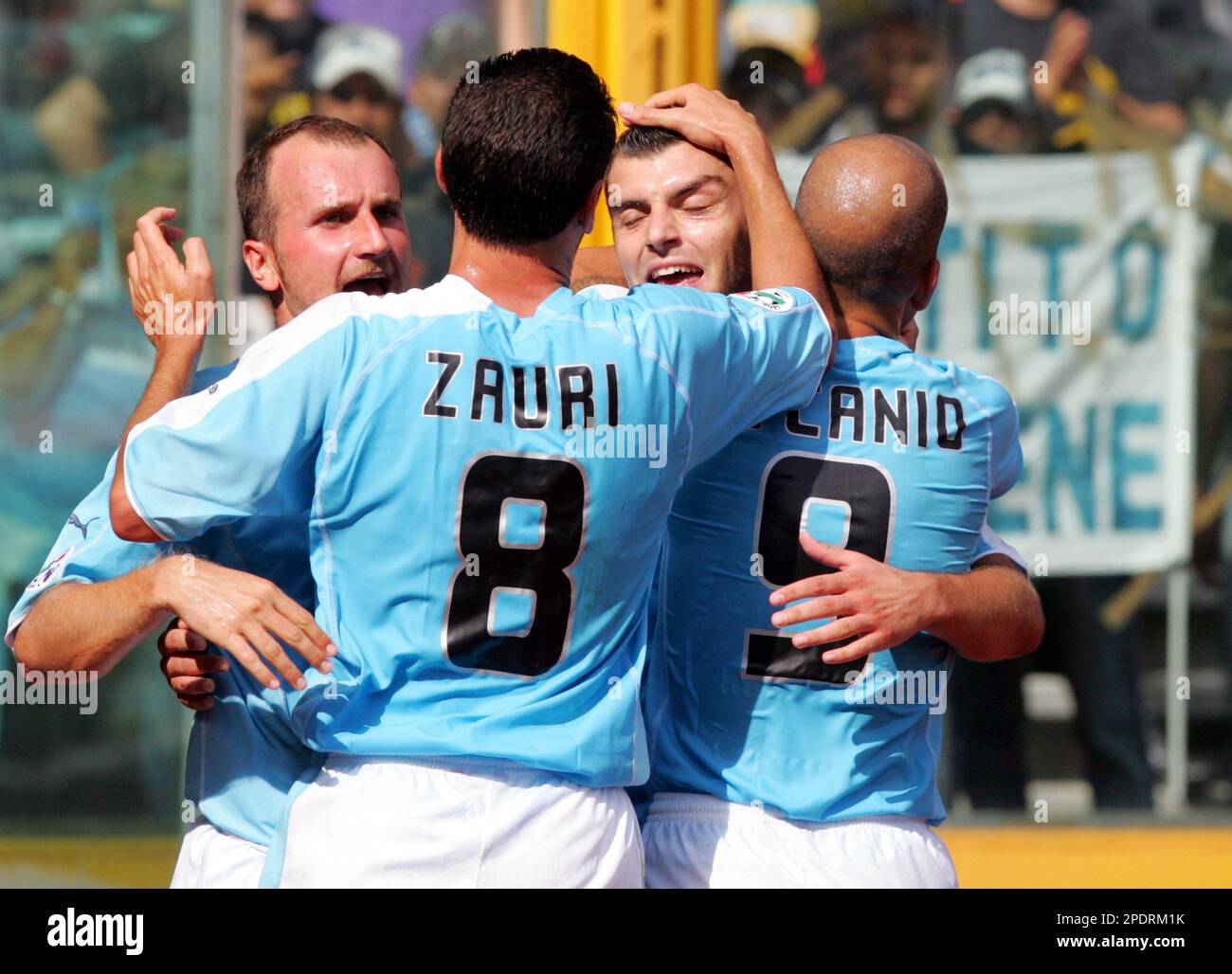 Lazio players cheer after scoring during the Italian Serie A