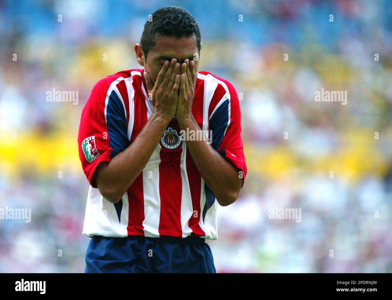 Chivas' Ramon Morales reacts after missing a shot against Necaxa during ...
