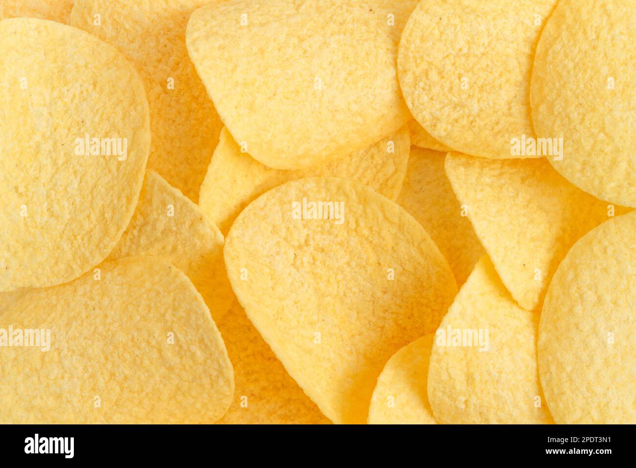 Crispy potato chips texture or background. Close up Stock Photo - Alamy