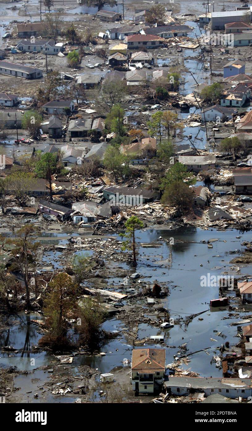 A neighborhood destroyed by Hurricane Katrina is shown in this aerial ...