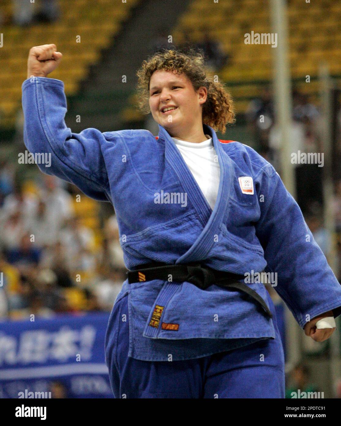 Carol Uilenhoed of the Netherlands celebrates her bronze-medal win in the  Women's open-weight Judo on the final day of the 24th World Judo  Championships in Cairo, Egypt Sunday, Sept. 11, 2005. (AP