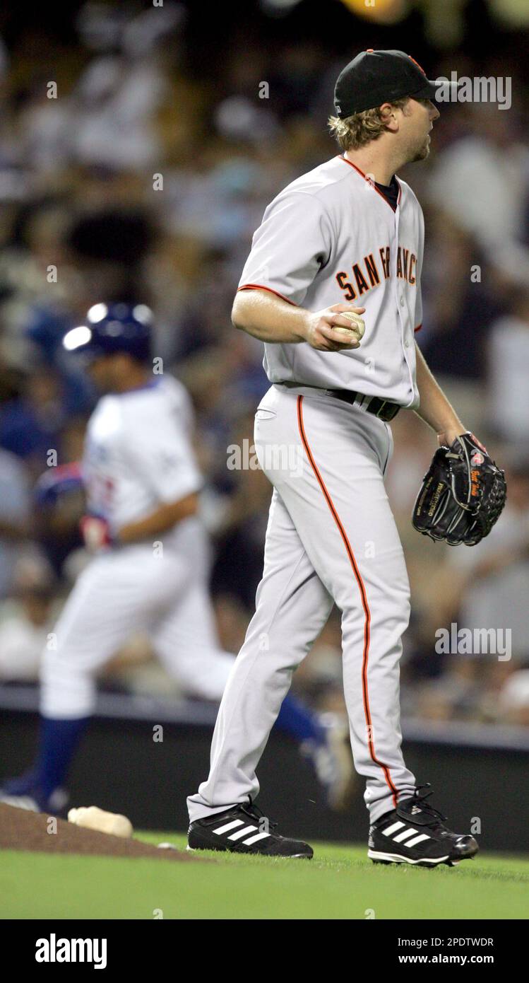 Los Angeles Dodgers' Jose Cruz Jr. throws his bat away after striking out  against Philadelphia Phillies pitcher Brett Myers in the first inning in  Los Angeles on Wednesday, Aug. 10, 2005. Cruz