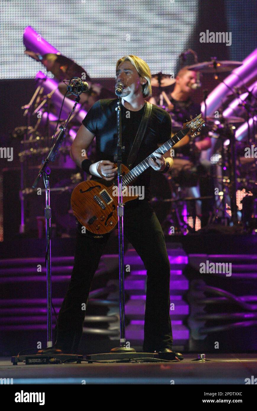 Chad Kroeger Nickelback performing live in concert at the Acer Arena
