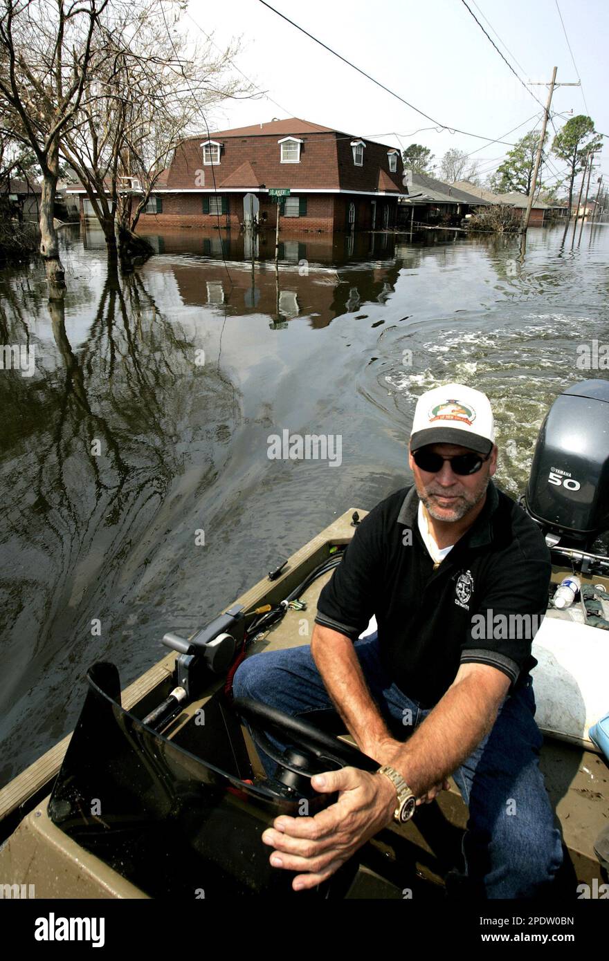 Joe Licciardi, 50, a police officer in St. Bernard Parish, surveys