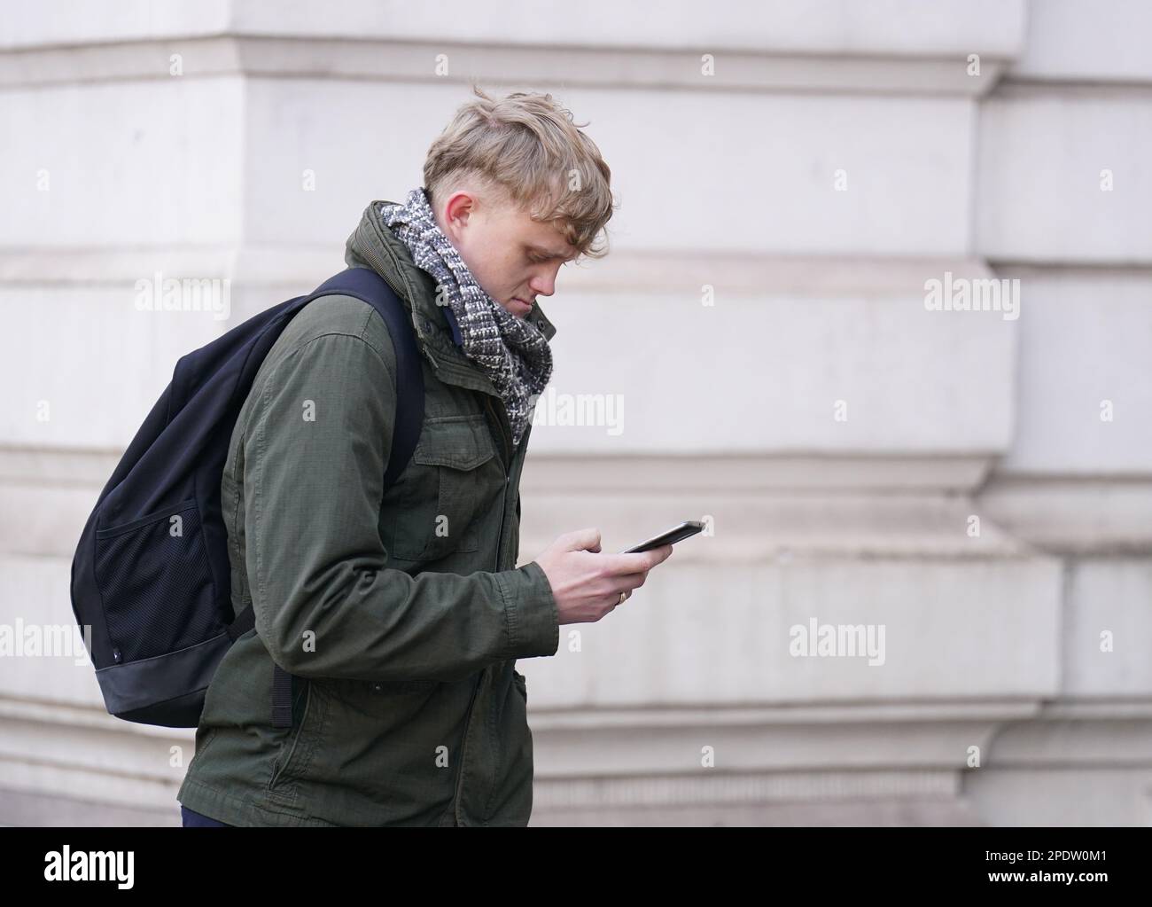 West Yorkshire Police detention officer William Loyd-Hughes arrives at Westminster Magistrates' Court, in central London, accused of publishing images in support of a proscribed organisation, the Ulster Defence Association (UDA) contrary to the Terrorism Act 2000; and three charges under the Communications Act 2003 of sharing grossly offensive messages on Twitter. The alleged offences are believed to have taken place in August and September 2022, while he was working for WYP. Picture date: Wednesday March 15, 2023. Stock Photo