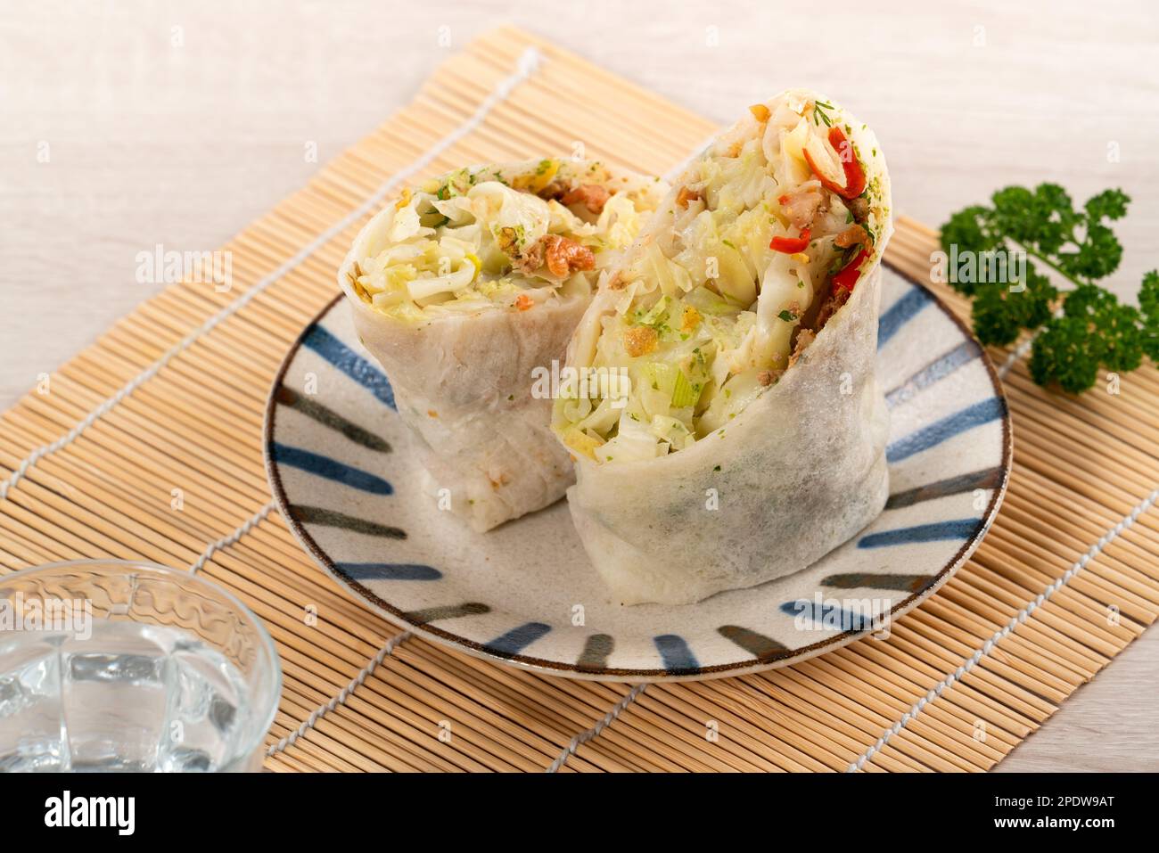 Delicious popiah, lumpia, Taiwanese spring roll for traditional Tomb Sweeping Day,  Qingming Festival food. Stock Photo