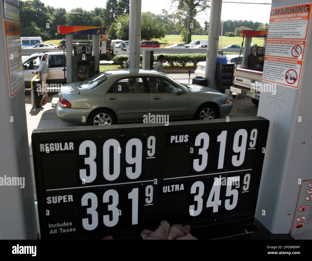 People fill their tanks up at Larry's Sunoco on Route 1 in Princeton, N