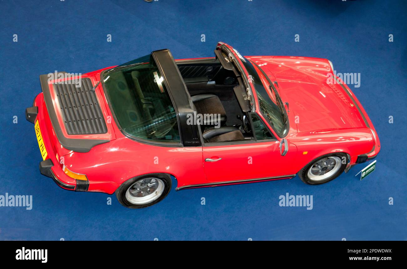 Aerial view of a Red, 1986, Porsche 911 Carrera Targa (3.2 litre),  part of the 2023 London Classic Car Auction at Olympia, London Stock Photo