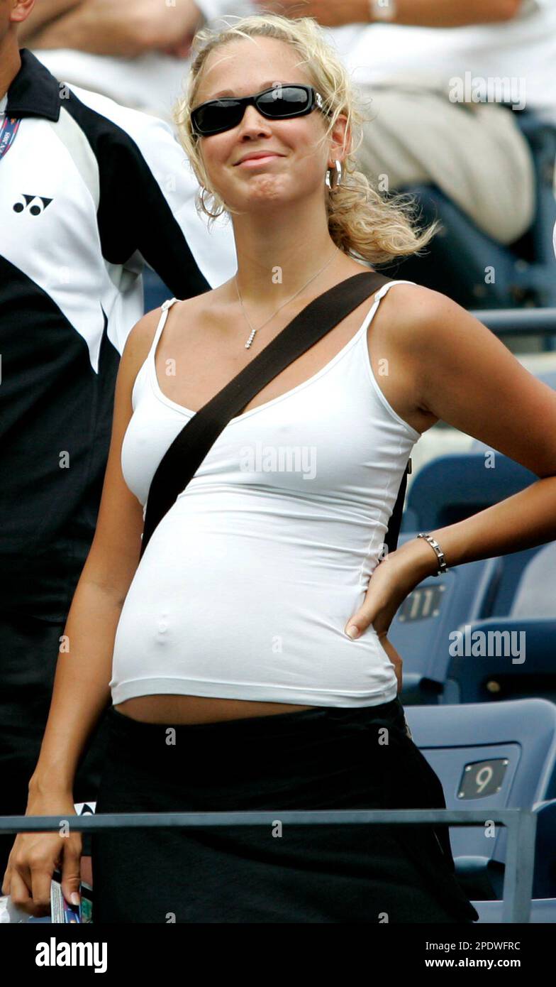 Australian actress Bec Cartwright, wife of Lleyton Hewitt of Australia, watches the match between Hewitt and Albert Costa of Spain, at the US Open tennis tournament in New York, Wednesday Aug. 31, 2005. (AP Photo/Elise Amendola) Stock Photo