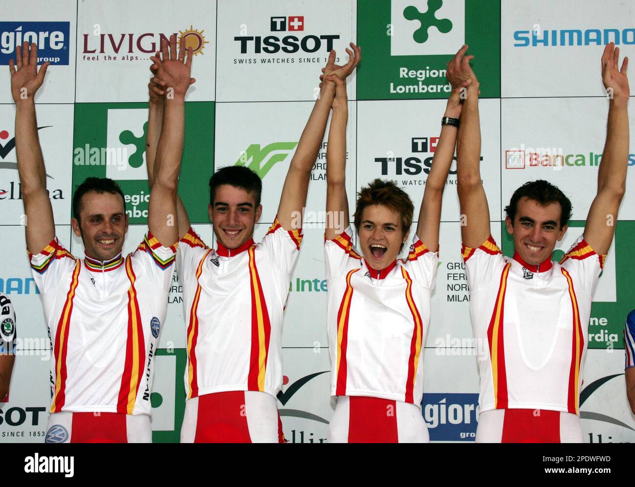 From left, Spanish riders Antonio Jose Ramos Hermida, Oliver Gilabert Aviles,  Rocio Ferrera Gamonal and Ruben Cueto Ruzafa cheer on the podium after  winning the Team Relay event at the UCI Mountain