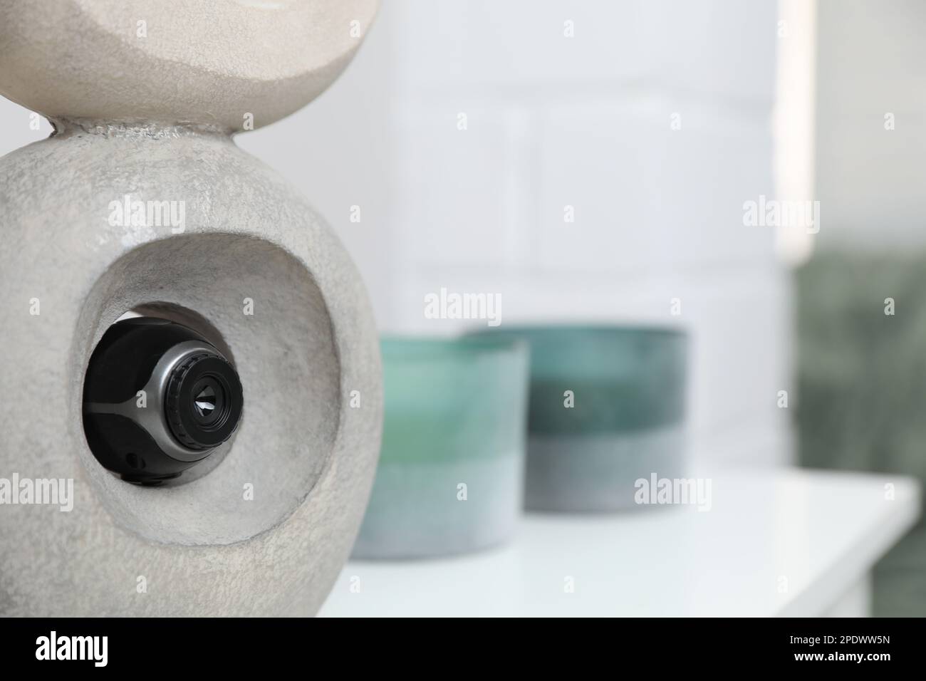 Small camera hidden in statue at home, closeup Stock Photo Alamy