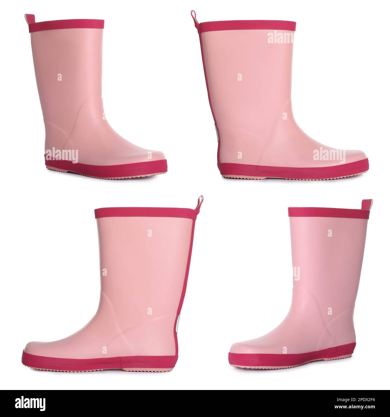 Set with pink rubber boots on white background Stock Photo Alamy
