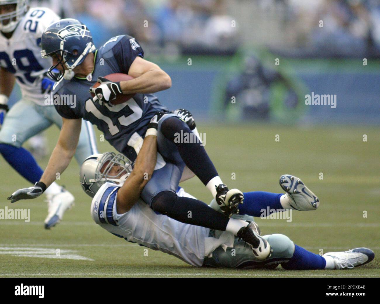 Seattle Seahawks running back Shaun Alexander scores in the first quarter  against the St. Louis Rams at Qwest Field in Seattle on November 13, 2005.  Alexander romped for 165 yards on a