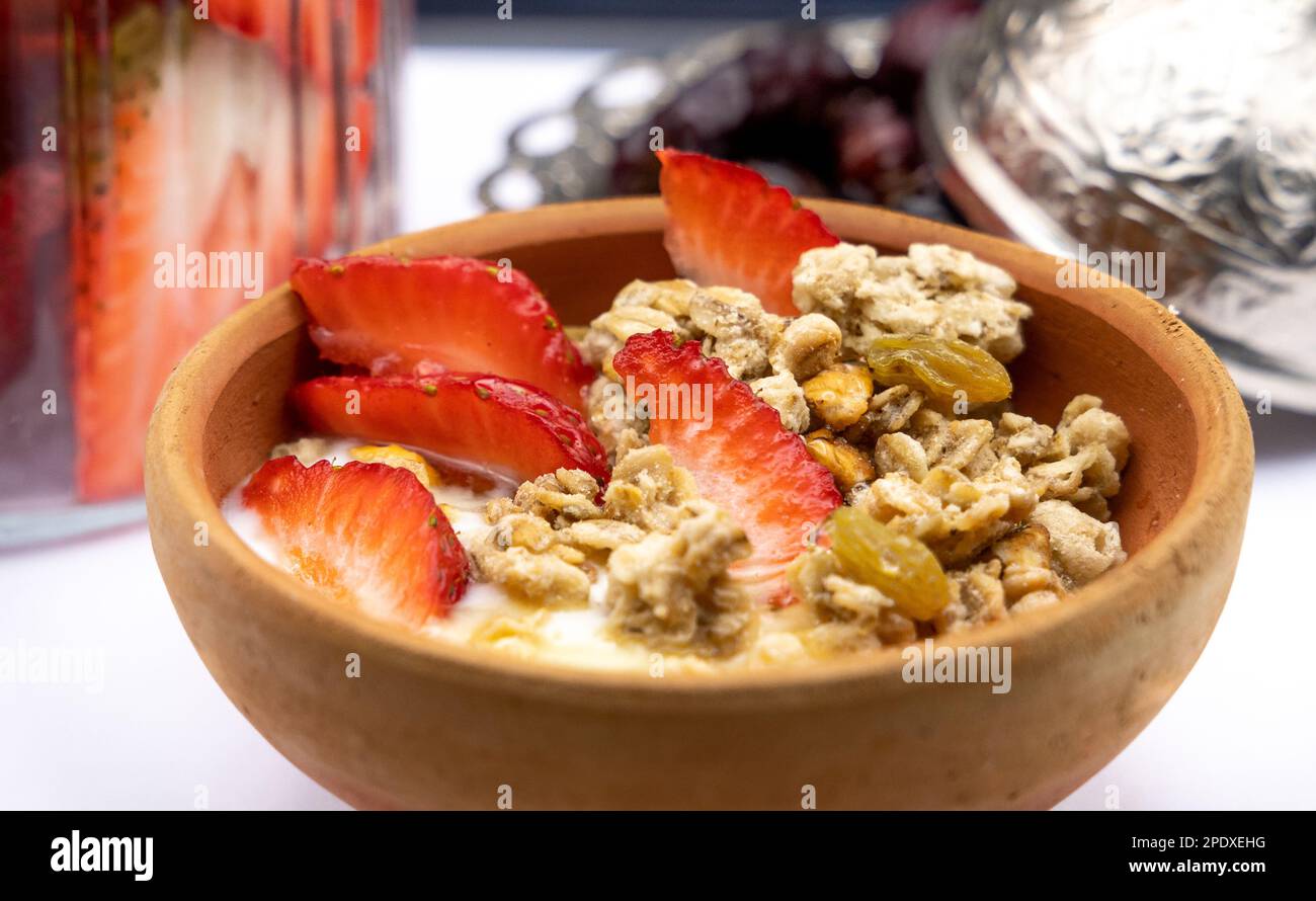 Healthy Breakfast Cereals Oats, Strawberry, honey with Yogurt nuts in