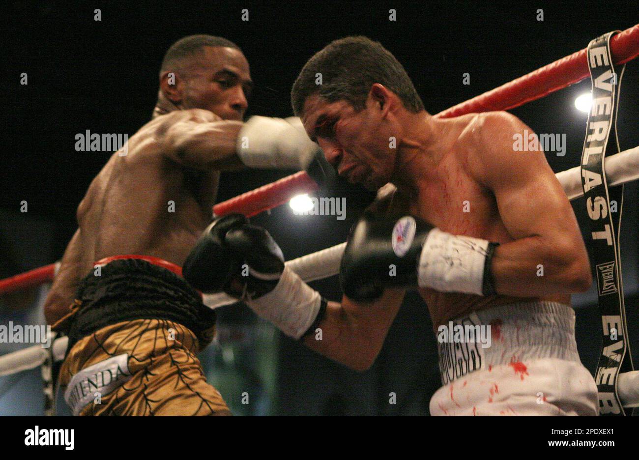 Panama s Roberto Spider Vasquez right exchanges blows with