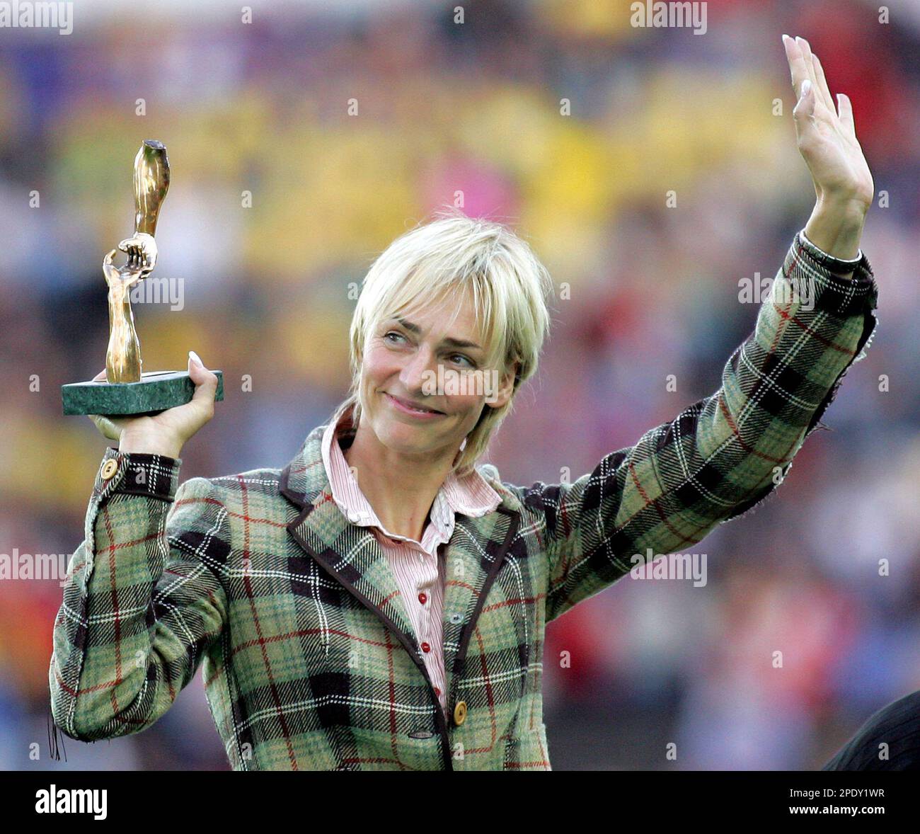 German athletics legend Heike Drechsler waves after receiving a special German athletics legend Heike Drechsler waves after receiving a special
