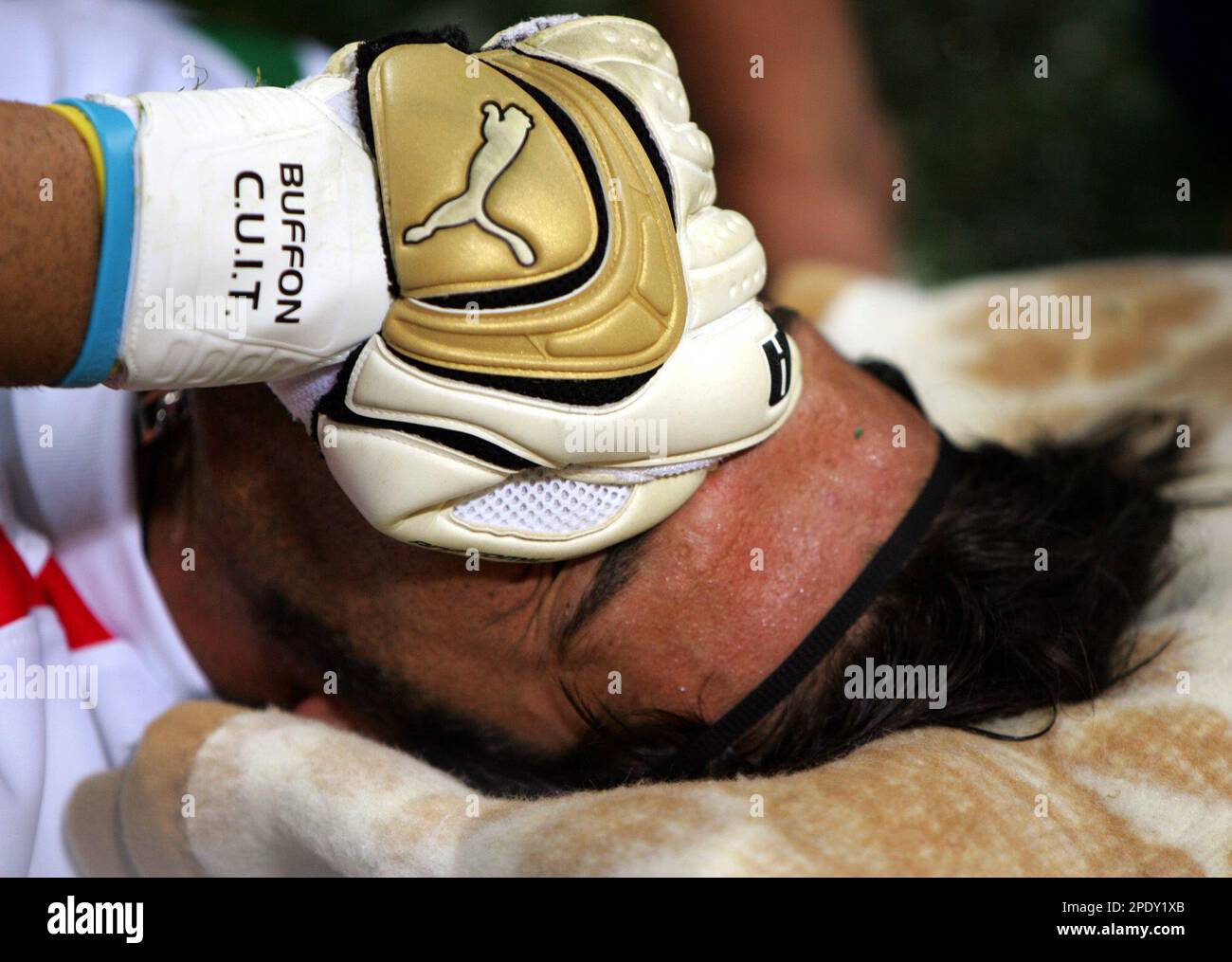 Juventus goalkeeper Gianluigi Buffon is in pain after injury during the ...