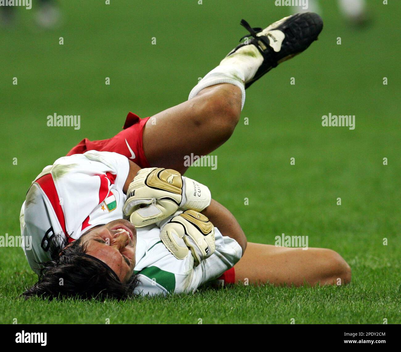 Juventus goalkeeper Gianluigi Buffon is in pain after injury during the ...