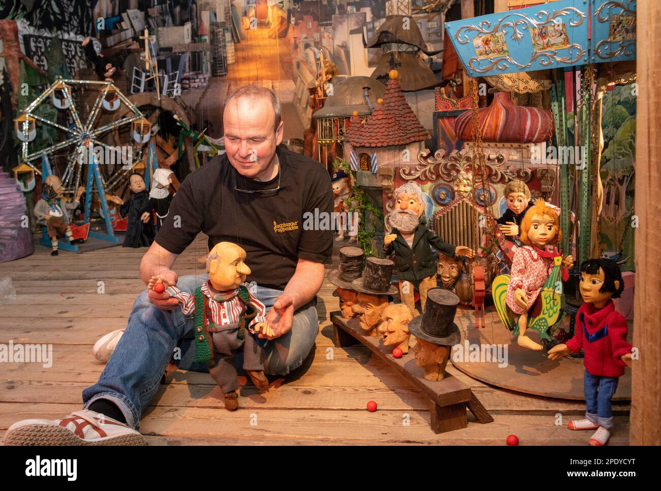 Augsburg, Germany. 15th Mar, 2023. Puppeteer Hans Kautzmann sets up