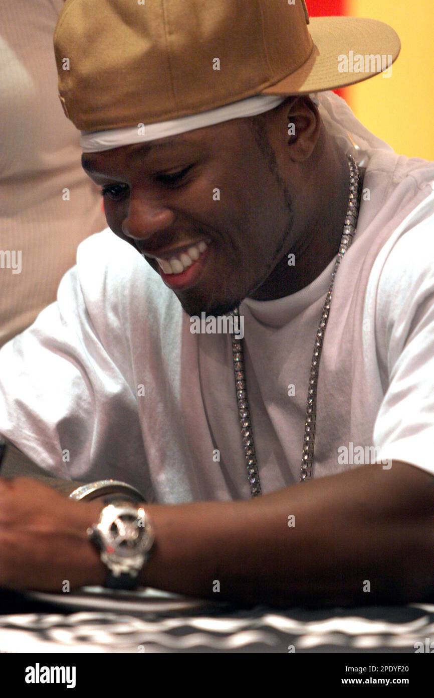 Sold at Auction: 50 Cent Signed Photograph