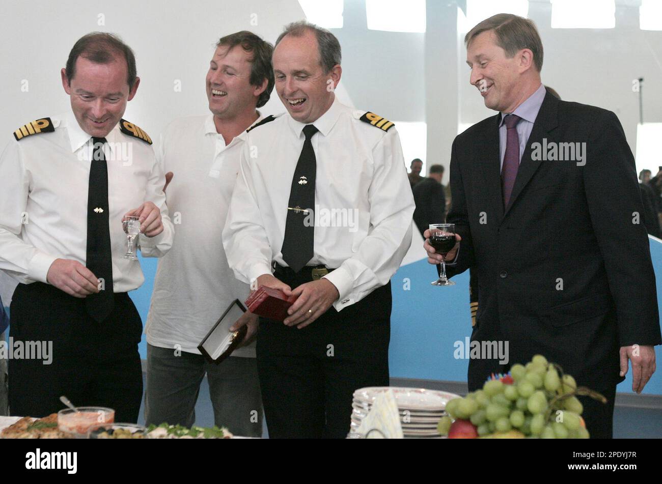 Russian Defence Minister Sergei Ivanov, right, toasts with Commander ...
