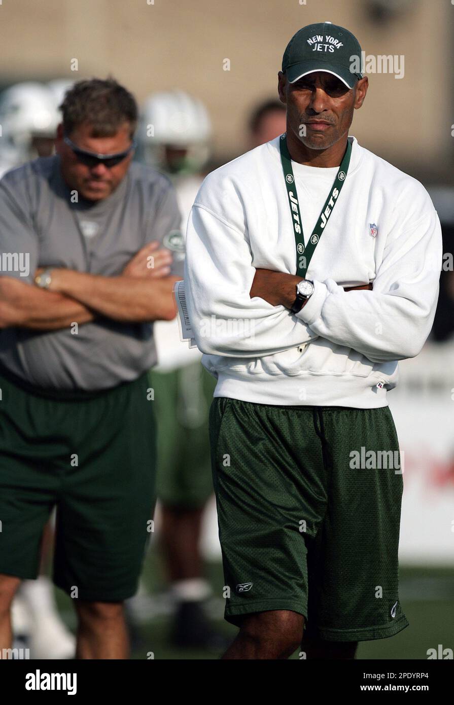 Mike Emeringer New York Jets head coach Herman Edwards, right, paces the field while ...
