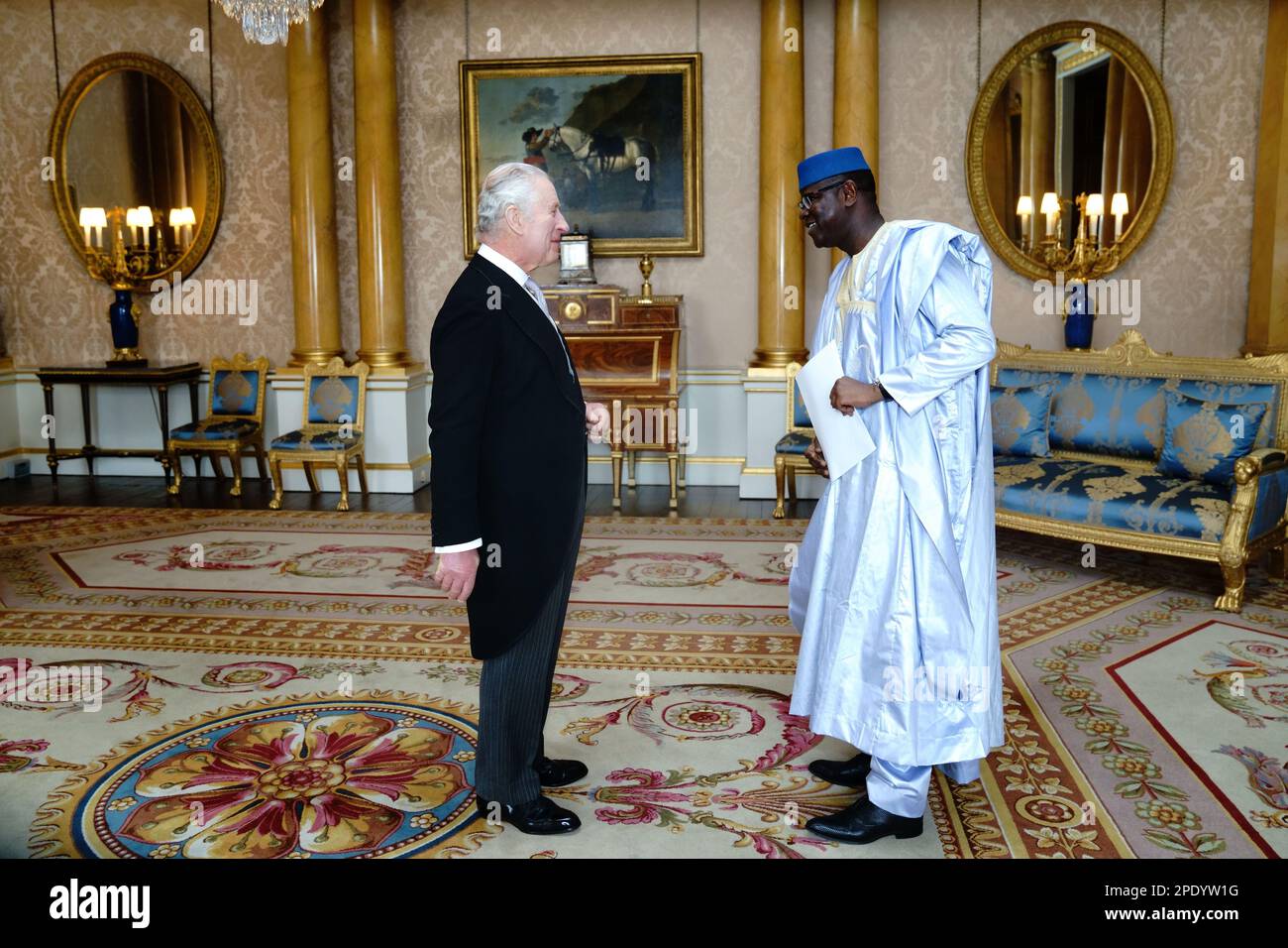King Charles III receives the Ambassador from the Republic of Mali, El Hadji Alhousseini Traore, during an audience at Buckingham Palace, London. Picture date: Wednesday March 15, 2023. Stock Photo
