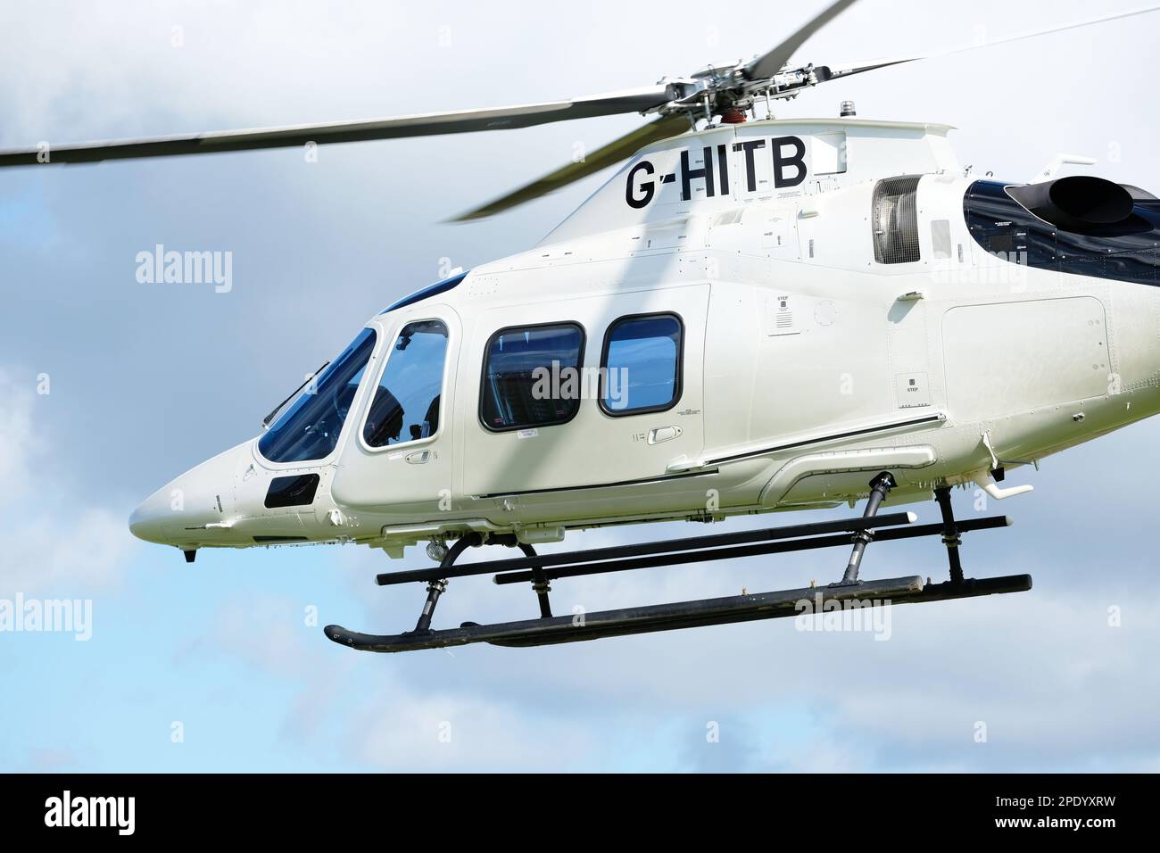 Leonardo Agusta A109S Trekker executive helicopter in flight - registration G-HITB taken March 2023 Stock Photo