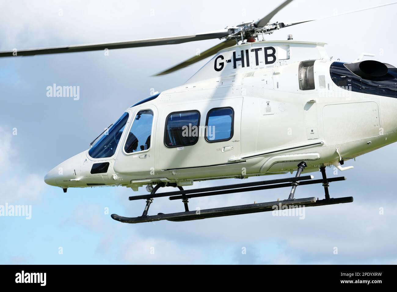 Leonardo Agusta A109S Trekker executive helicopter in flight registration GHITB taken March