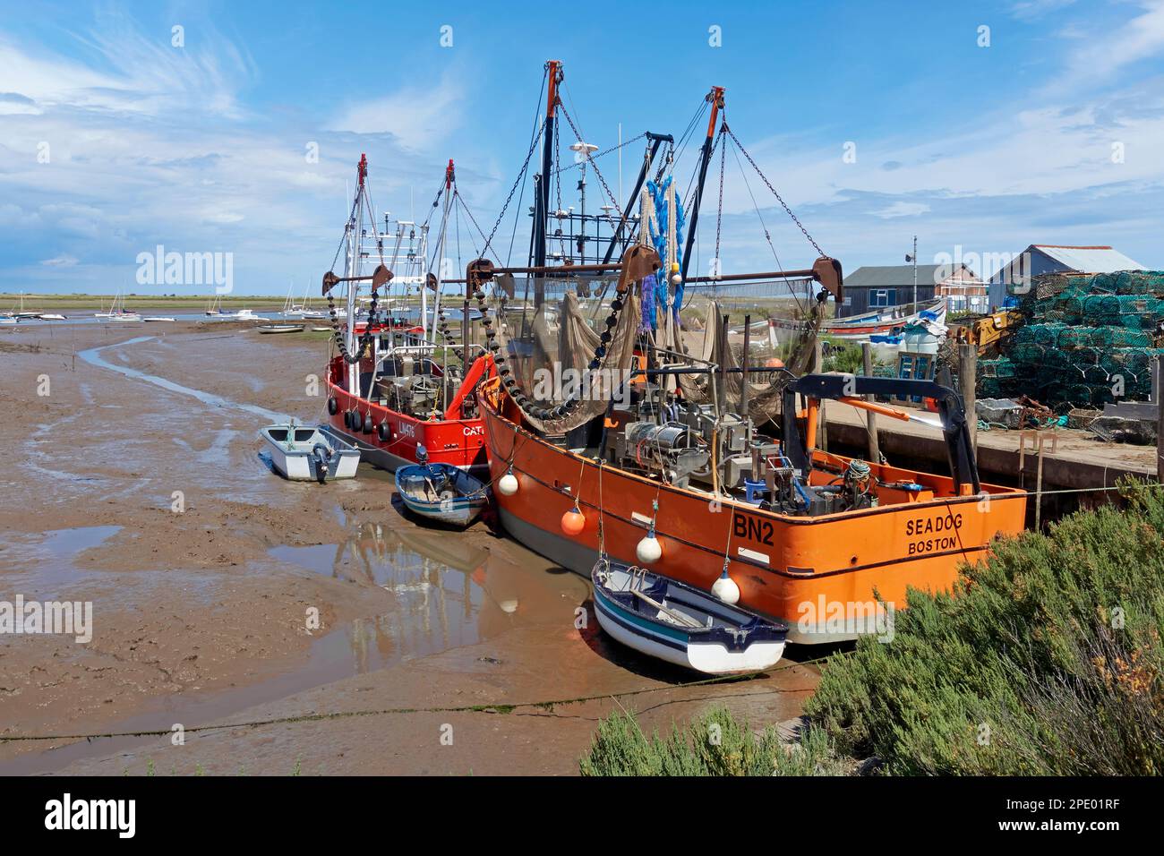 The beam trawlers moored at Brancaster Staithe Quay, Norfolk, England. Stock Photo