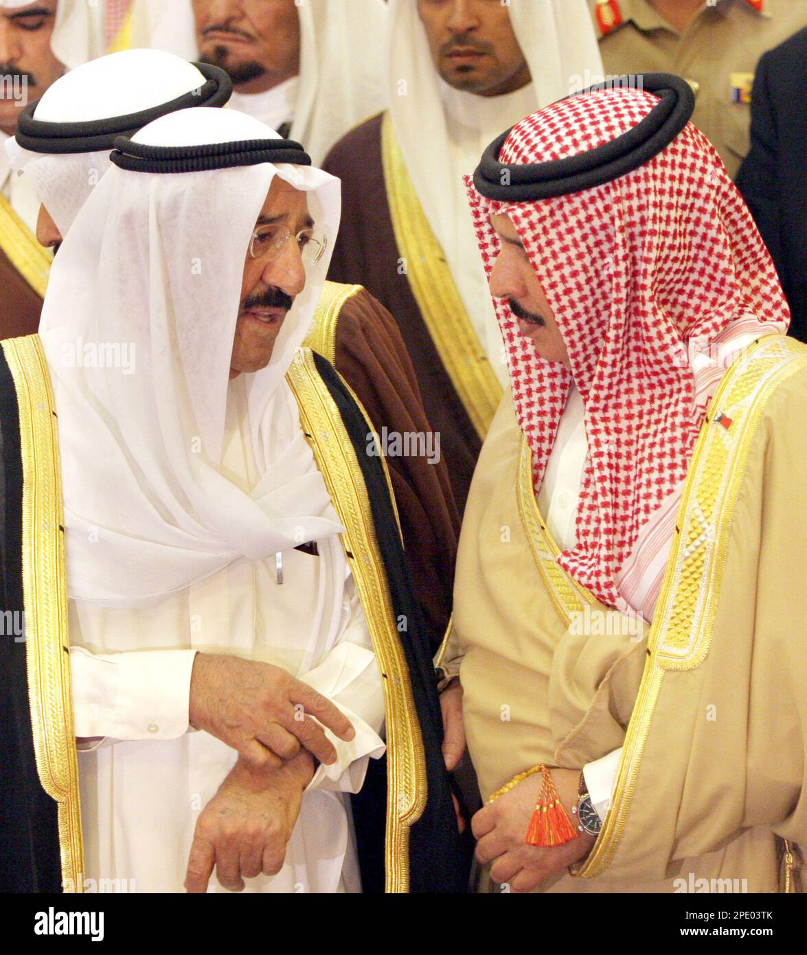 Kuwait's Prime Minister Sheik Sabah Al Ahmed Al Sabah, left, talks to ...