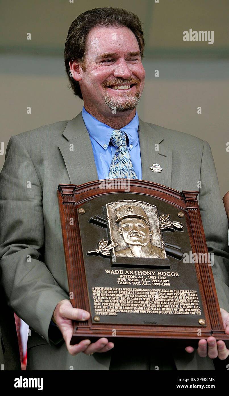 Wade Boggs, one of the newest members of the National Baseball Hall of Fame  displays his plaque during induction ceremonies Sunday, July 31, 2005 in  Cooperstown, N.Y. Boggs, who played for the