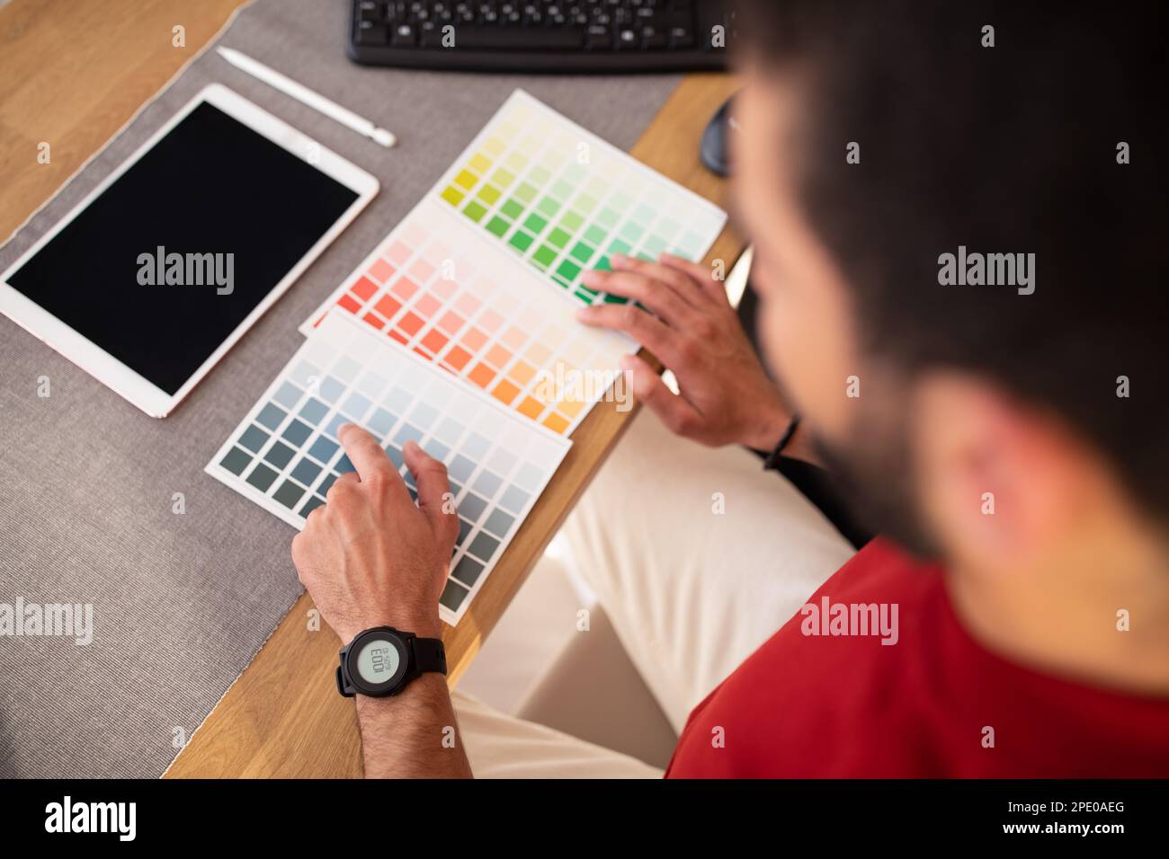 Male photo editor using graphics tablet in office Stock Photo