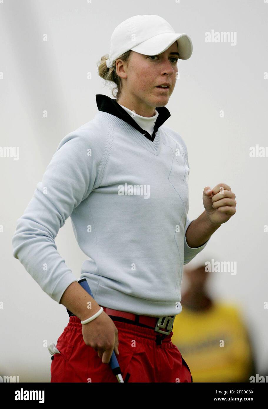 Amateur player, Swedens Louise Stahle clenches her fist in celebration after putting on the 14th green, on the second day of the Womens British Open golf tournament at the Royal Birkdale course
