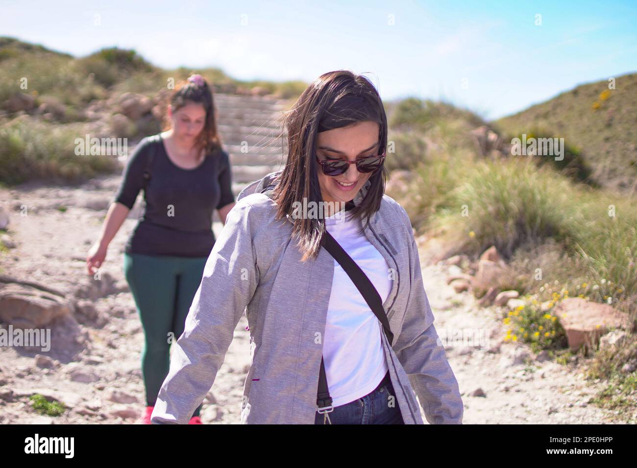 Seashore, coastline, scenic view of people at unspoiled beach in Almeria, called Playa de los Muertos, in English The beach of Deads due to the strong Stock Photo