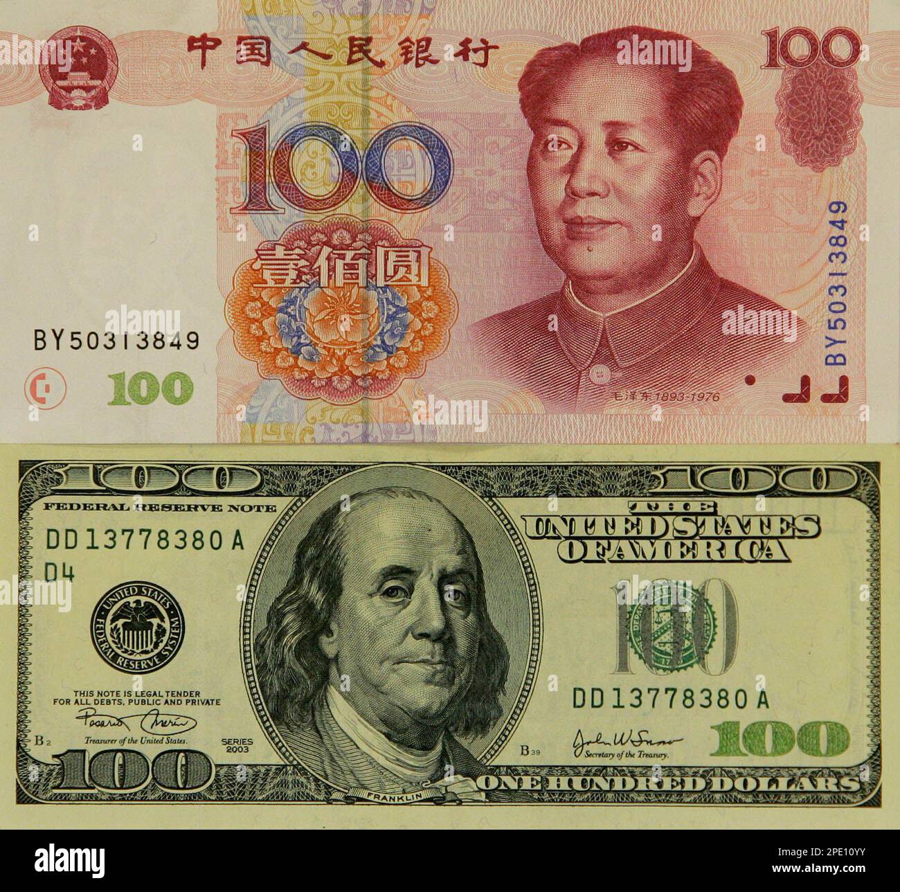 Chinese yuan and U.S. dollar bank notes are seen in Hong Kong Thursday,  July 21, 2005. China said it will no longer peg its currency, the yuan, to  the U.S. dollar but