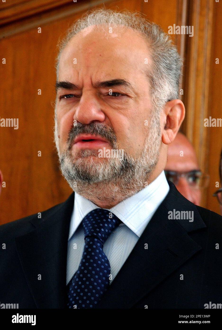 Iraqi Prime Minister Ibrahim alJaafari observes a threeminute silence