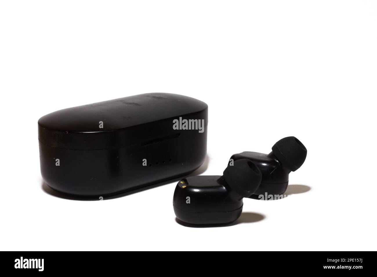 Black charging box for earbuds on white background Stock Photo Alamy