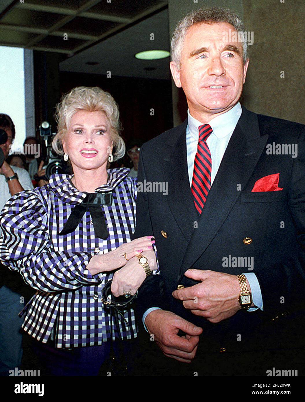 FILE ** Actress Zsa Zsa Gabor and her husband, Prince Frederic von Anhalt,  leave court in Beverly Hills, Calif., in this July 13, 1989 file picture.  Gabor suffered an apparent stroke