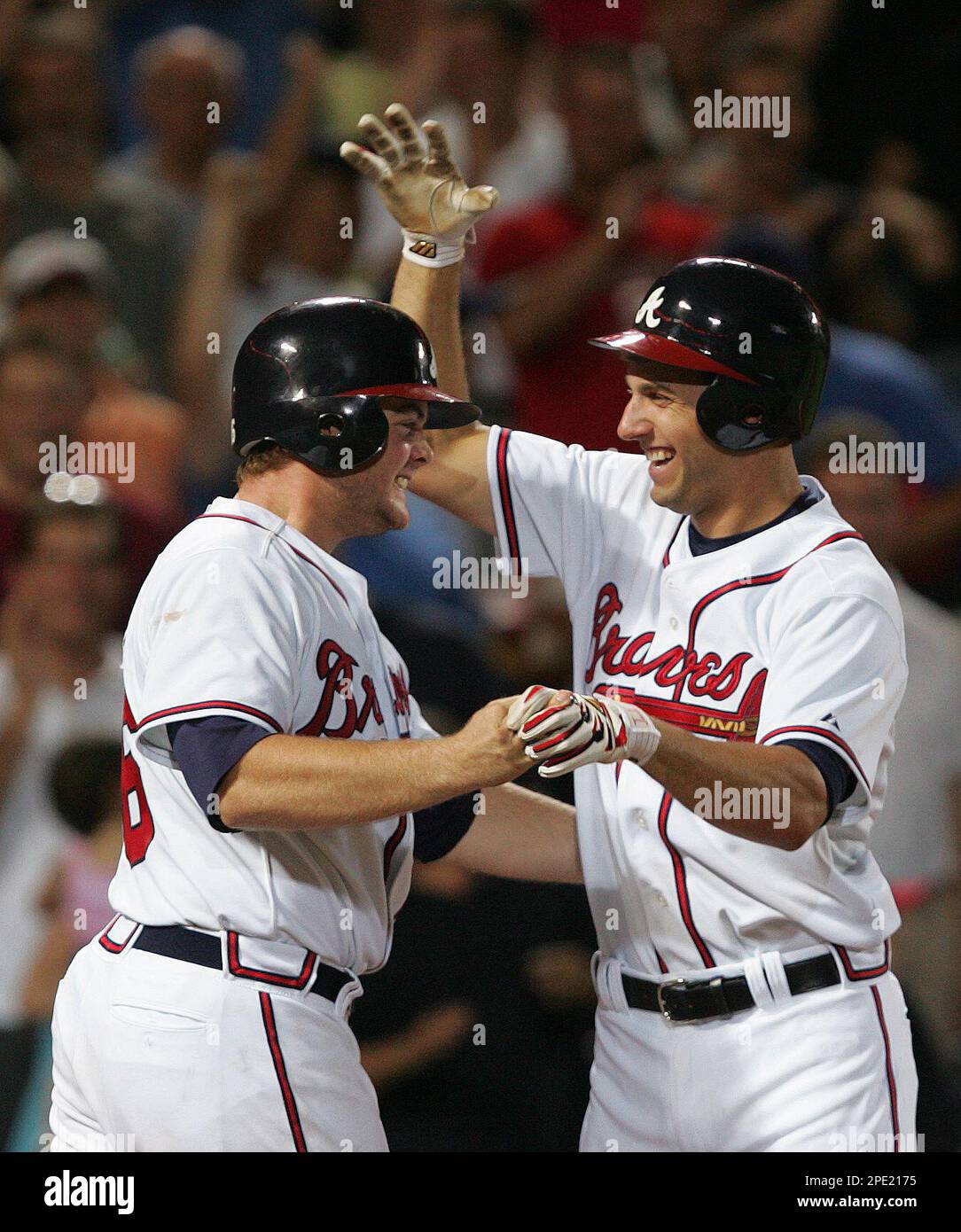 Atlanta Braves rookie Jeff Francoeur, right, celebrates with rookie catcher Brian  McCann after hitting a three-run homer off Chicago Cubs relief pitcher  Glendon Rusch in the eighth inning of the second game