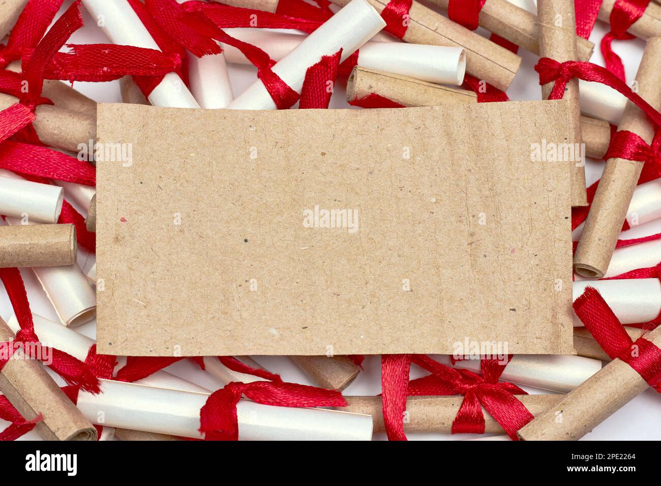 Romantic scrapbook letters love notes tied with a red satin ribbon. Mockup for design Stock