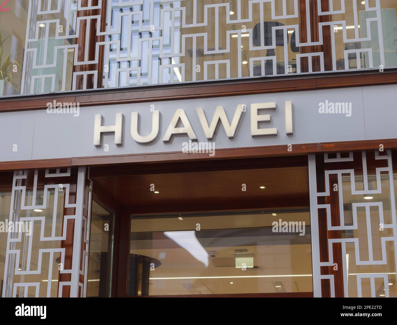 Vienna, Austria - August 8, 2022: Huawei logo on old building wall. Huawei is leading global provider of information and communications technology infrastructure and smart devices Stock Photo