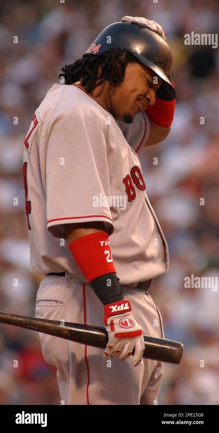 Boston Red Sox's Manny Ramirez strikes out swinging to Texas Rangers' Chan  Ho Park in the fourth inning, Wednesday, July 6, 2005 in Arlington, Texas.  (AP Photo/Linda Kaye Stock Photo - Alamy