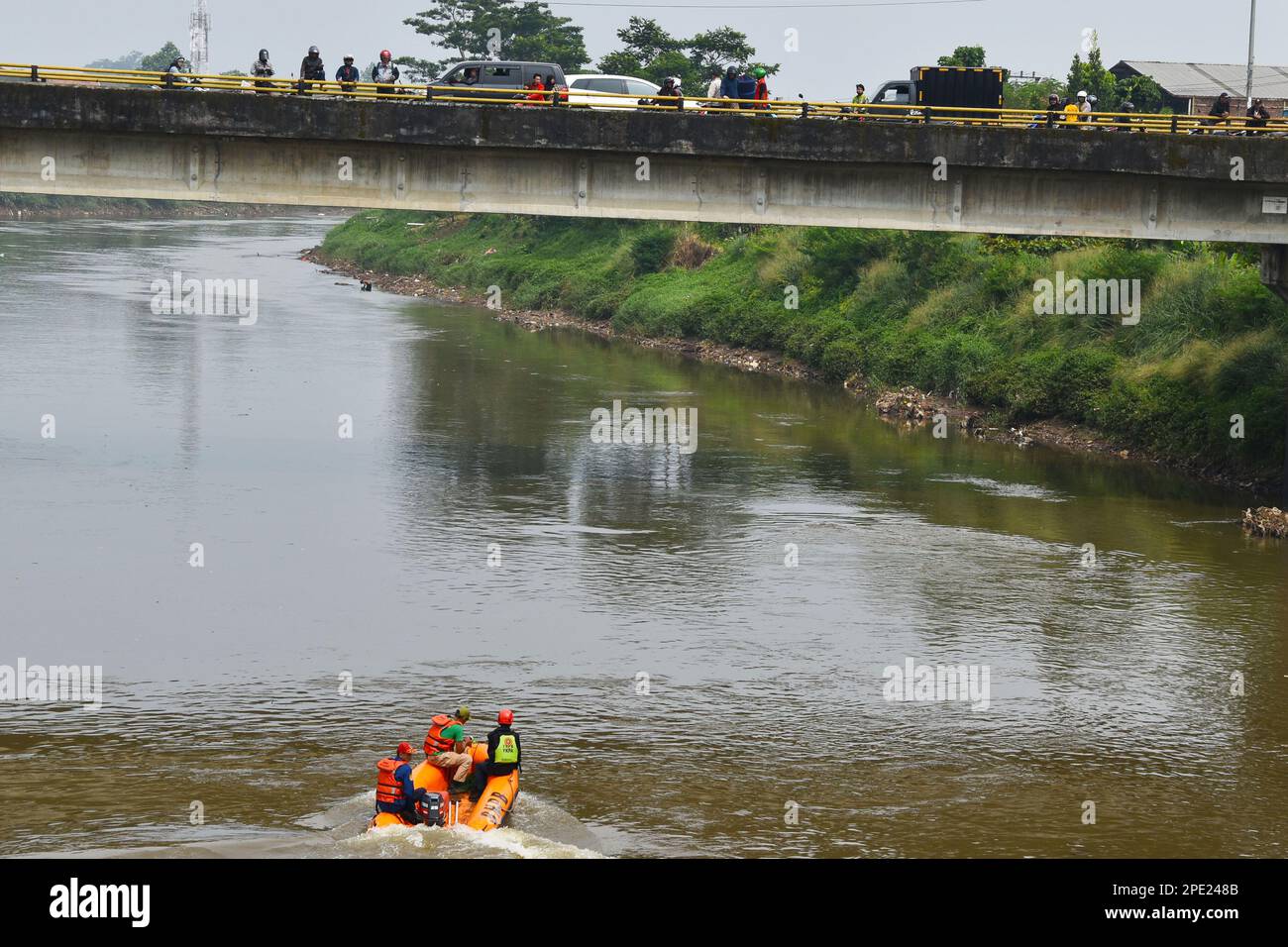 Bandung, Indonesia. 14th Mar, 2023. Rescue team search for a child who drowned in the Citarum River, Jelegong Village, Kutawaringin District, Bandung Regency, Indonesia on March 14, 2023. (Photo by Dimas Rachmatsyah/INA Photo Agency/Sipa USA) Credit: Sipa USA/Alamy Live News Stock Photo