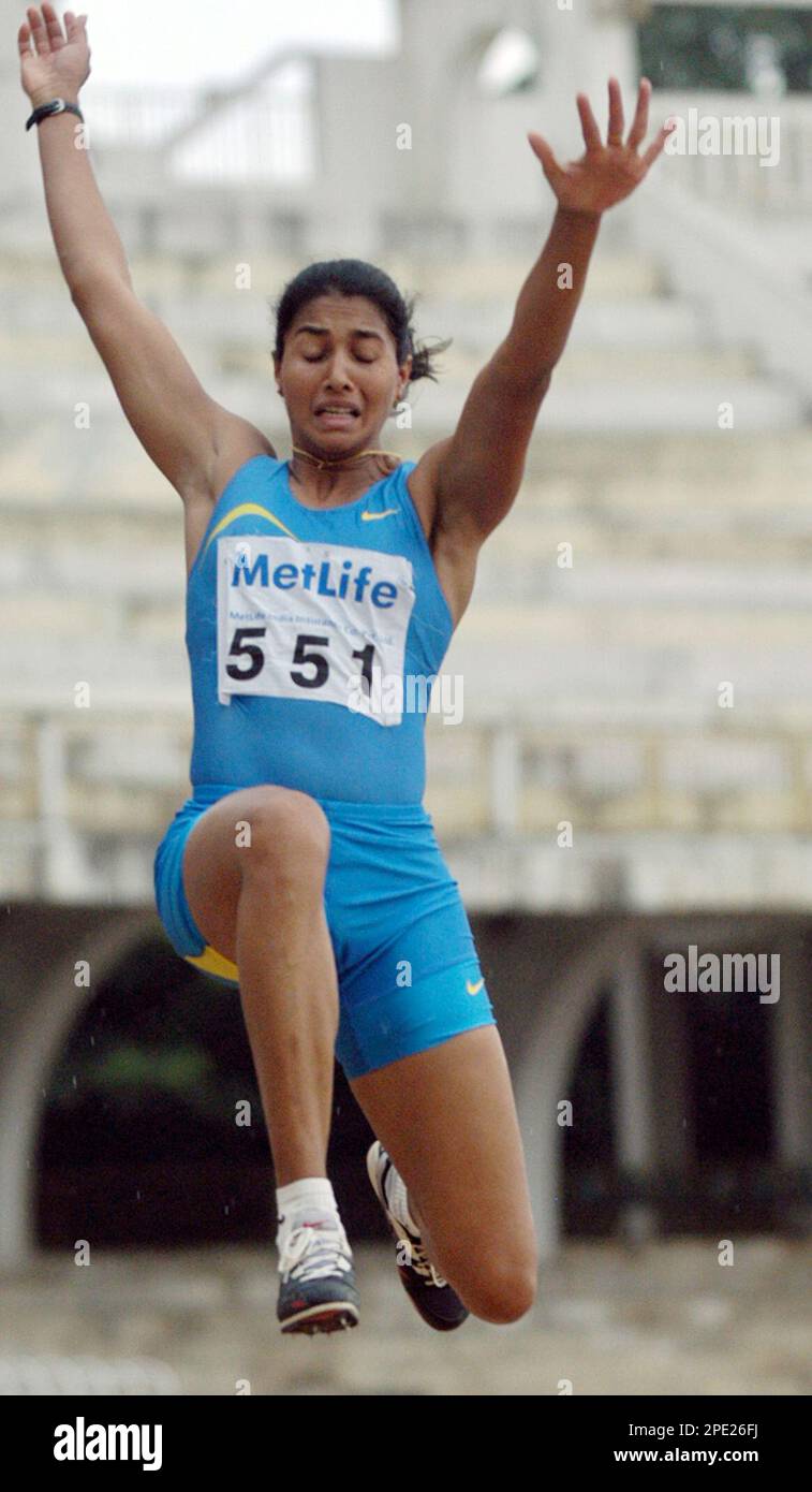 Indian athlete Anju Bobby George jumps in the final of the women's long ...