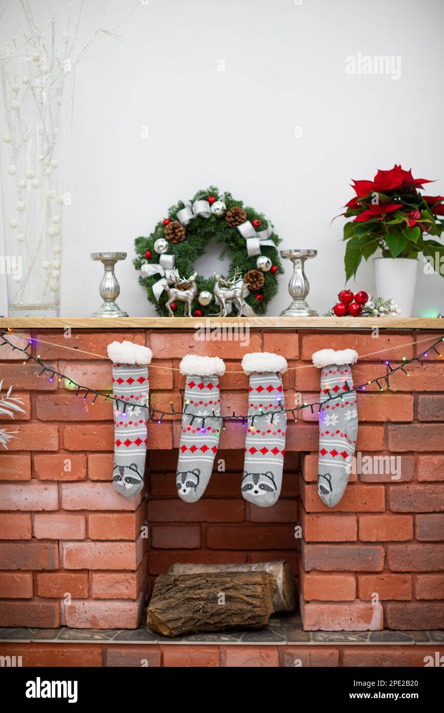 Christmas living room with fireplace and decorations Stock Photo - Alamy
